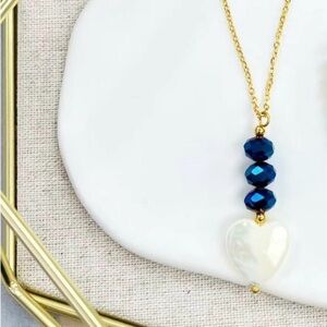 18” Stainless Steel necklace with mother of pearl heart ❤️.